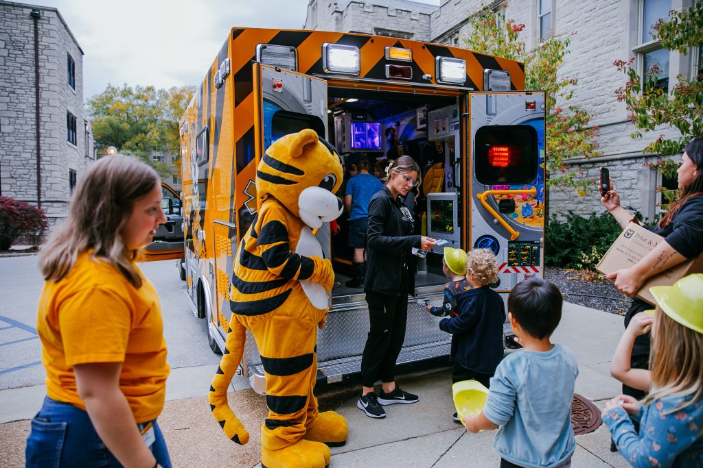 A Mizzou Health ambulance and Truman the tiger visit the Child Development Lab and shows children the equipment